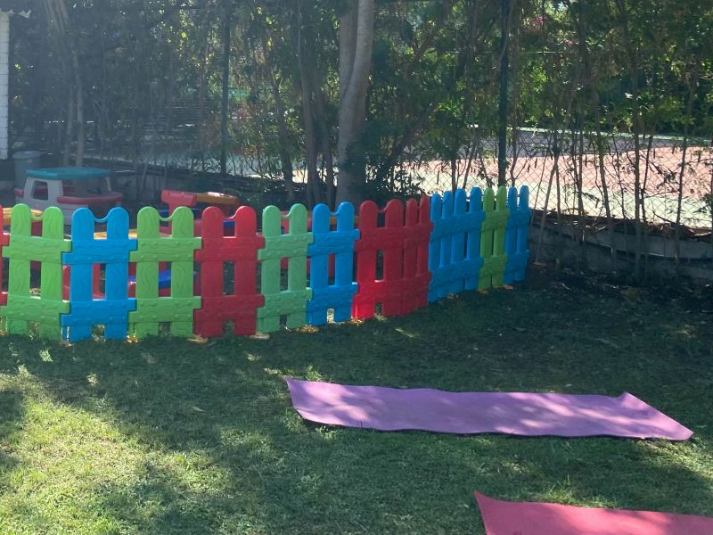 Children Playing Near Fence